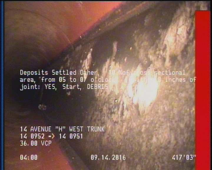 Deposits Settled Other, 15 %of cross sectional area, from 05 to 07 o'clock, , within 8 inches of joint: YES, Start - DEBRIS