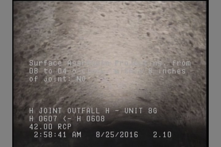 Surface Aggregate Projecting, from 08 to 04 o'clock, within 8 inches of joint: NO