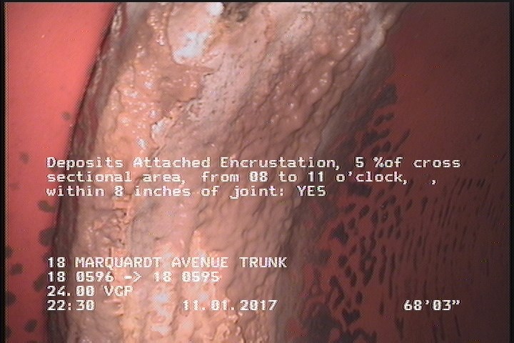 Deposits Attached Encrustation, 5 %of cross sectional area, from 08 to 11 o'clock, , within 8 inches of joint: YES