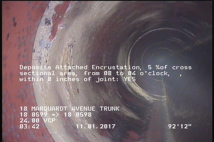 Deposits Attached Encrustation, 5 %of cross sectional area, from 08 to 04 o'clock, , within 8 inches of joint: YES