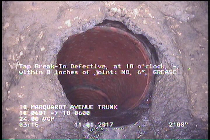 Tap Break-In Defective, at 10 o'clock, -, , within 8 inches of joint: NO, 6" - GREASE
