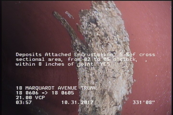 Deposits Attached Encrustation, 5 %of cross sectional area, from 02 to 05 o'clock, , within 8 inches of joint: YES