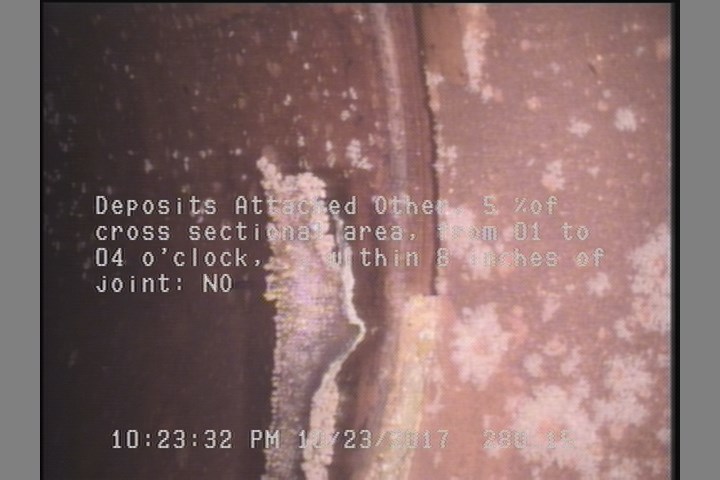 Deposits Attached Other, 5 %of cross sectional area, from 01 to 04 o'clock, , within 8 inches of joint: NO