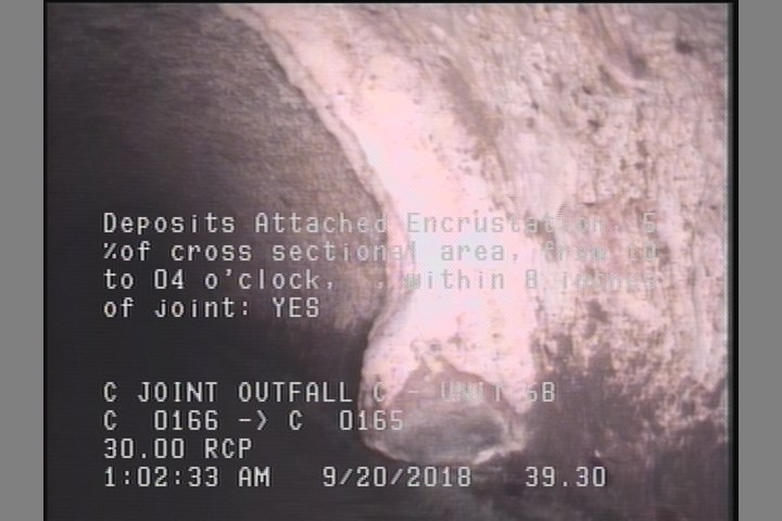 Deposits Attached Encrustation, 5 %of cross sectional area, from 10 to 04 o'clock, , within 8 inches of joint: YES