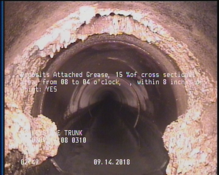 Deposits Attached Grease, 15 %of cross sectional area, from 08 to 04 o'clock, , within 8 inches of joint: YES