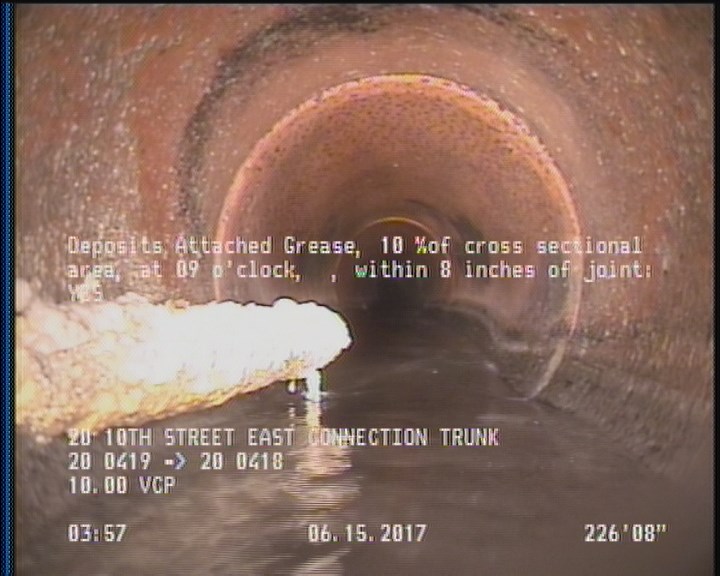 Deposits Attached Grease, 10 %of cross sectional area, at 09 o'clock, , within 8 inches of joint: YES