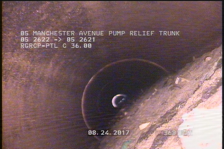 Deposits Settled Other, 55 %of cross sectional area, from 03 to 09 o'clock, , within 8 inches of joint: YES - TONS OF DEBRIS