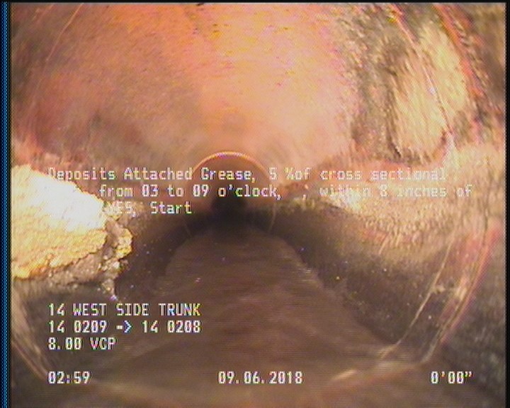 Deposits Attached Grease, 5 %of cross sectional area, from 03 to 09 o'clock, , within 8 inches of joint: YES, Start