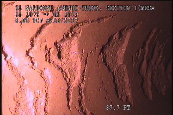 Surface Spalling, from 11 to 01 o'clock, within 8 inches of joint: YES - PIPE DEFECT OR SURFACE PEELING