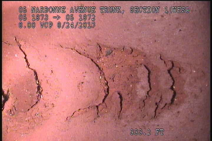 Surface Spalling, from 12 to 01 o'clock, within 8 inches of joint: YES - PIPE DEFECT OR SURFACE PEELING