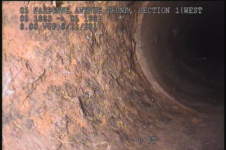 Surface Spalling, from 08 to 04 o'clock, within 8 inches of joint: YES - CAST IRON PIPE 1'