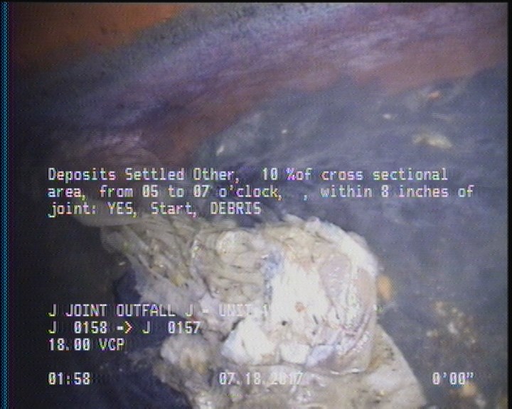 Deposits Settled Other, 10 %of cross sectional area, from 05 to 07 o'clock, , within 8 inches of joint: YES, Start - DEBRIS