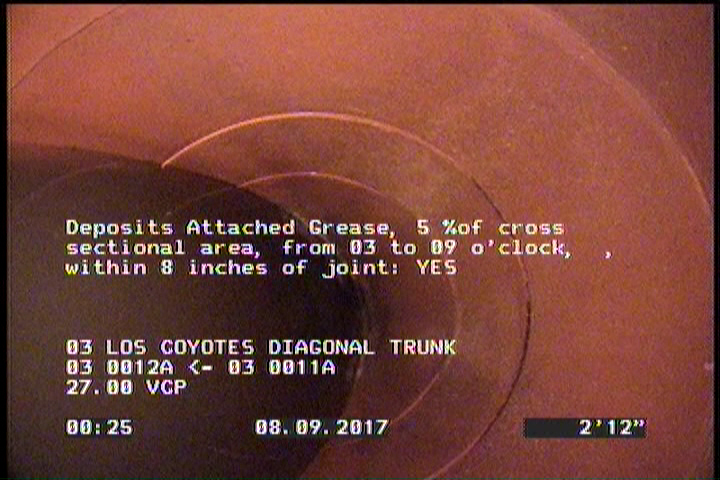 Deposits Attached Grease, 5 %of cross sectional area, from 03 to 09 o'clock, , within 8 inches of joint: YES