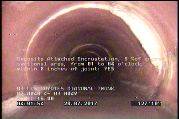 Deposits Attached Encrustation, 5 %of cross sectional area, from 01 to 04 o'clock, , within 8 inches of joint: YES