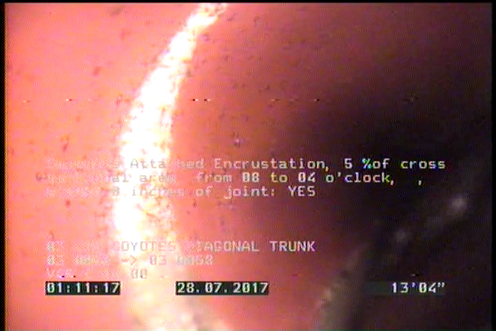 Deposits Attached Encrustation, 5 %of cross sectional area, from 08 to 04 o'clock, , within 8 inches of joint: YES