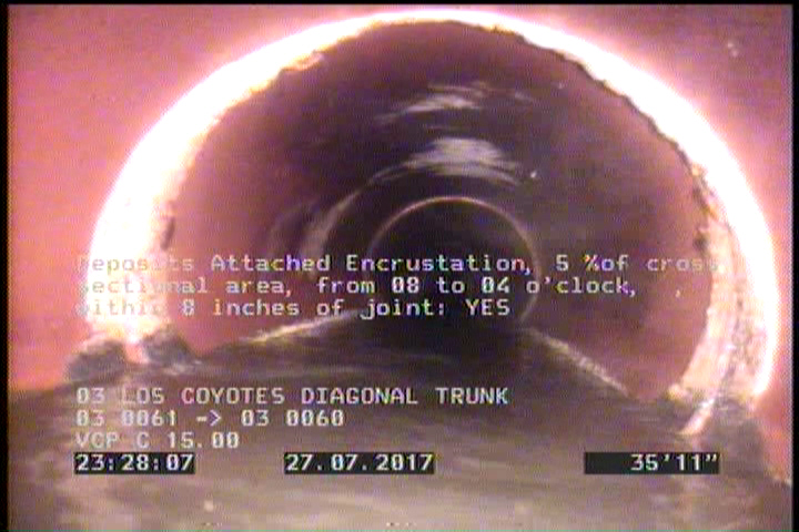 Deposits Attached Encrustation, 5 %of cross sectional area, from 08 to 04 o'clock, , within 8 inches of joint: YES