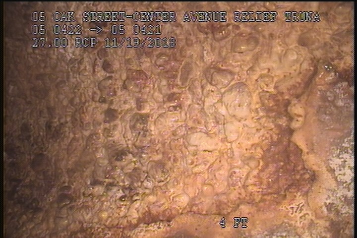 Surface Aggregate Projecting, from 09 to 03 o'clock, within 8 inches of joint: YES, Start - SEVERE AGG UNDER MAG COAT