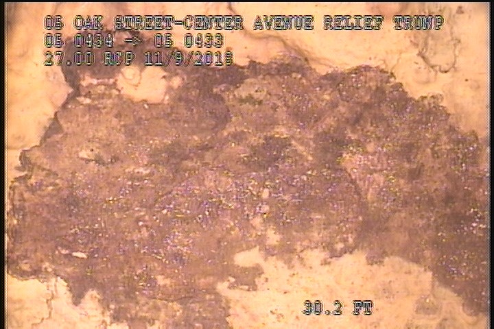 Surface Spalling, from 11 to 12 o'clock, within 8 inches of joint: NO - FLAKING CONCRETE