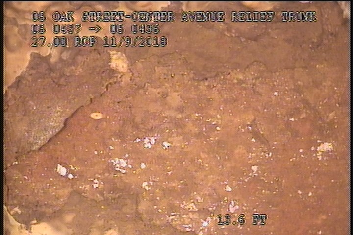 Surface Spalling, from 09 to 10 o'clock, within 8 inches of joint: NO - FLAKING CONCRETE