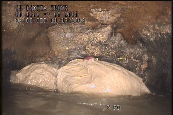 Deposits Settled Other, 90 %of cross sectional area, from 07 to 05 o'clock, , within 8 inches of joint: NO - SLUDGE PAPER