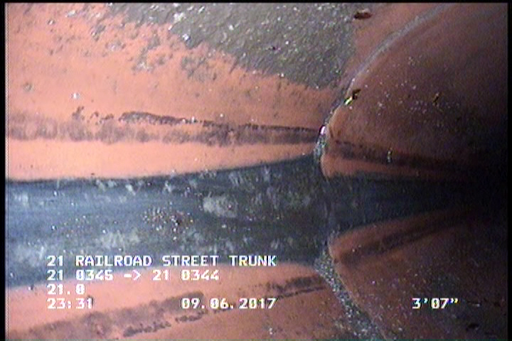 Deposits Attached Grease, 5 %of cross sectional area, at 06 o'clock, , within 8 inches of joint: YES
