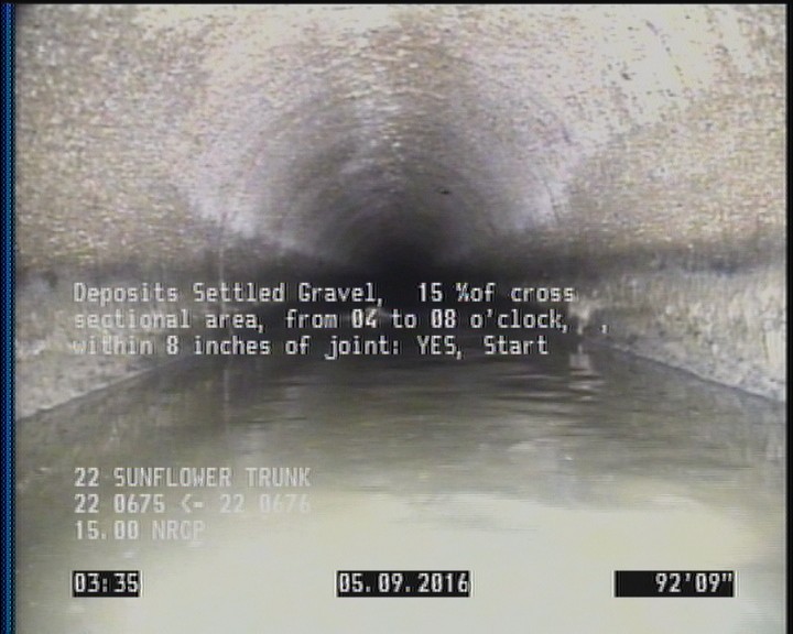 Deposits Settled Gravel, 15 %of cross sectional area, from 04 to 08 o'clock, , within 8 inches of joint: YES, Start
