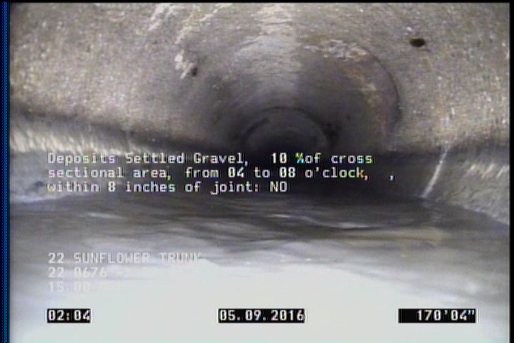 Deposits Settled Gravel, 10 %of cross sectional area, from 04 to 08 o'clock, , within 8 inches of joint: NO