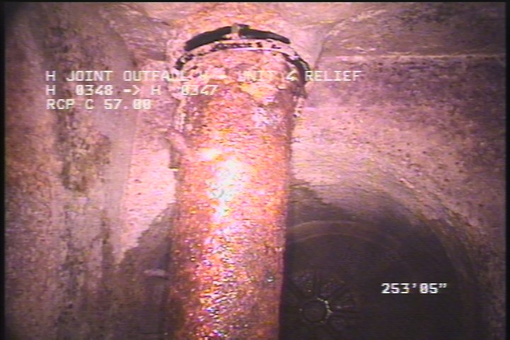 General Observation - METAL PIPE RUNNING THROUGH MH