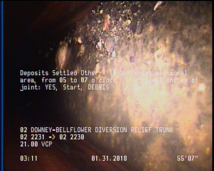 Deposits Settled Other, 15 %of cross sectional area, from 05 to 07 o'clock, , within 8 inches of joint: YES, Start - DEBRIS
