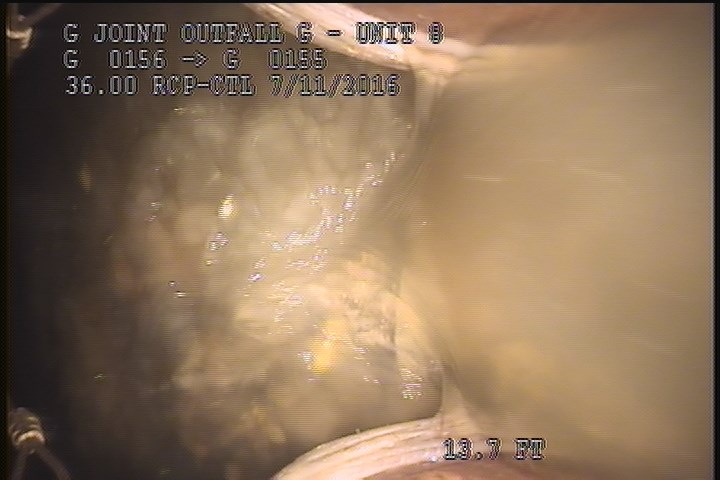 Deposits Settled Other, 20 %of cross sectional area, from 04 to 08 o'clock, , within 8 inches of joint: YES, Start - SLUDGE PAPER ROCKS
