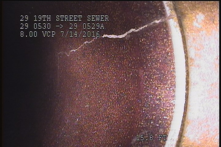 Crack Spiral, from 01 to 03 o'clock, within 8 inches of joint: YES