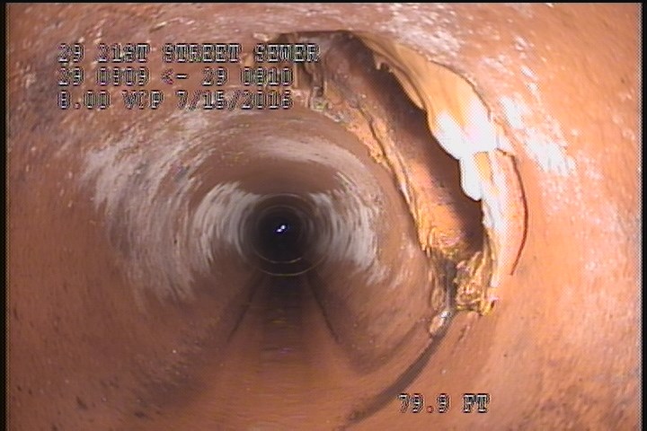 Tap Break-In Intruding, at 02 o'clock, -, -, within 8 inches of joint: NO, 6", 1", 6" - OPEN, POSSIBLE BREAK-IN