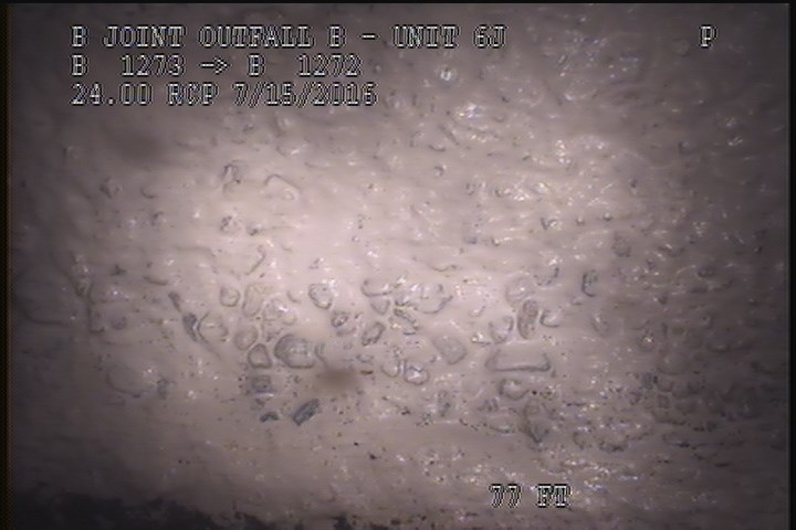 Surface Aggregate Projecting, from 08 to 11 o'clock, within 8 inches of joint: NO - SEVERE AGG UNDER MAG COAT
