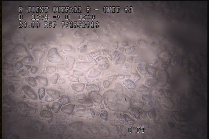 Surface Aggregate Projecting, from 08 to 04 o'clock, within 8 inches of joint: YES, Start - SEVERE AGG UNDER MAG COAT SPORATIC