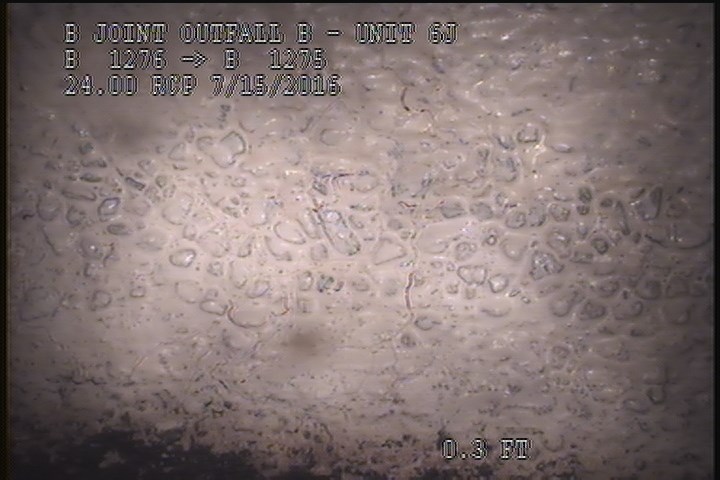 Surface Aggregate Projecting, from 08 to 04 o'clock, within 8 inches of joint: YES, Start - SEVERE AGG UNDER MAG COAT SPORATIC