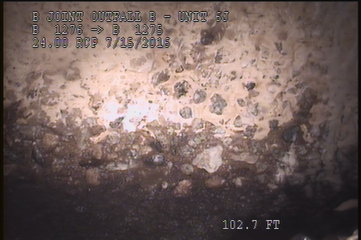 Surface Aggregate Projecting, from 12 to 04 o'clock, within 8 inches of joint: YES - SEVERE AGG