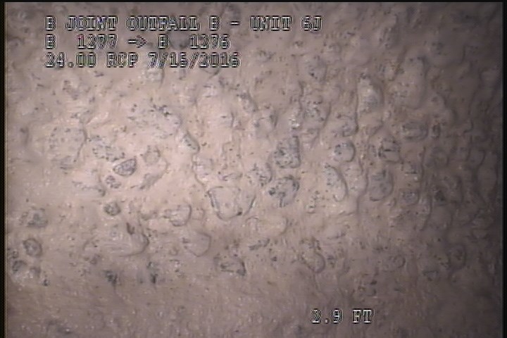 Surface Aggregate Projecting, from 09 to 03 o'clock, within 8 inches of joint: YES, Start - SEVERE AGG UNDER MAG COAT