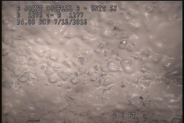 Surface Aggregate Projecting, from 09 to 03 o'clock, within 8 inches of joint: YES, Start - SEVERE AGG UNDER MAG COAT SPORATIC