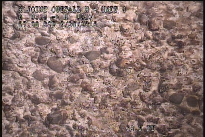 Surface Aggregate Projecting, from 01 to 02 o'clock, within 8 inches of joint: NO, - SEVERE AGG