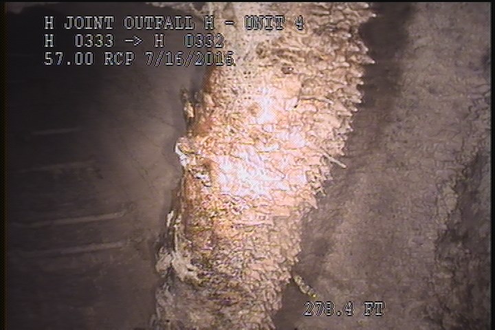General Observation - METAL PIPE THROUGH MH
