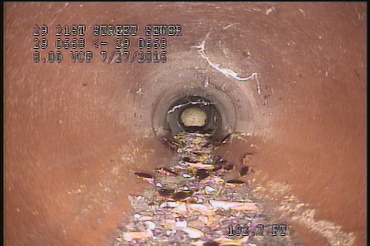 Deposits Attached Other, 5 %of cross sectional area, from 05 to 07 o'clock, , within 8 inches of joint: YES, Start - DEBRIS