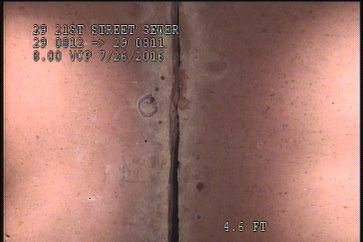 General Observation - CHIPPING ALL AROUND THE JOINT, POSSIBLE BROKEN PIPE