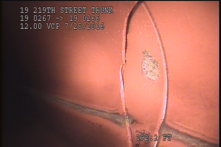Broken, from 01 to 05 o'clock, within 8 inches of joint: YES - SLIGHT FRACTURE-INDENTED