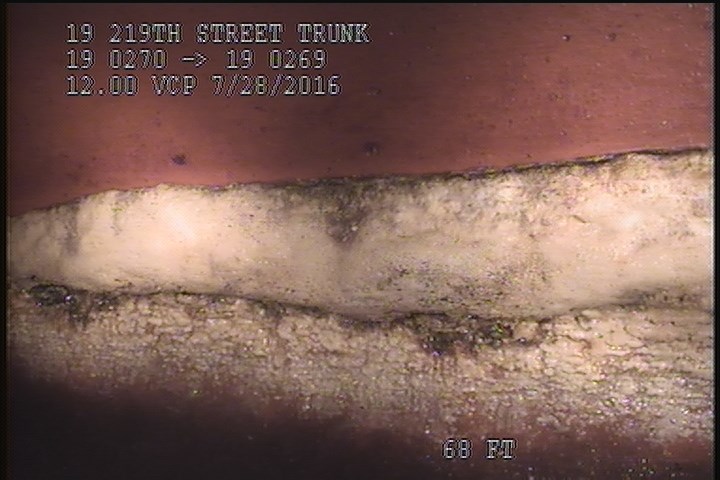 Deposits Attached Encrustation, 5 %of cross sectional area, from 02 to 03 o'clock, , within 8 inches of joint: YES