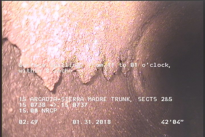 Surface Spalling, from 11 to 01 o'clock, within 8 inches of joint: YES