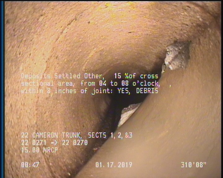 Deposits Settled Other, 15 %of cross sectional area, from 04 to 08 o'clock, , within 8 inches of joint: YES - DEBRIS