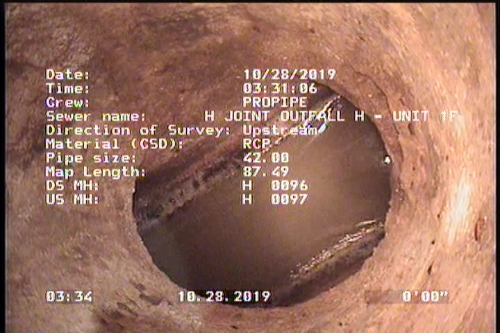 Downstream Manhole, Survey Begins - H 0096