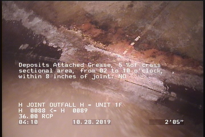 Deposits Attached Grease, 5 %of cross sectional area, from 02 to 10 o'clock, , within 8 inches of joint: NO