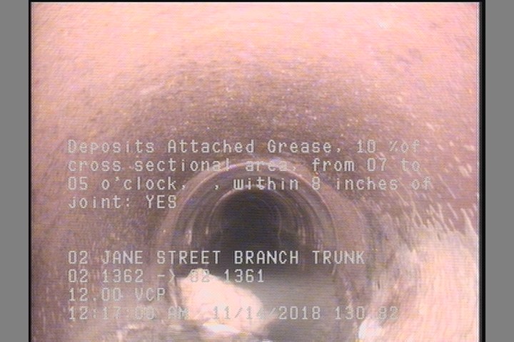 Deposits Attached Grease, 10 %of cross sectional area, from 07 to 05 o'clock, , within 8 inches of joint: YES