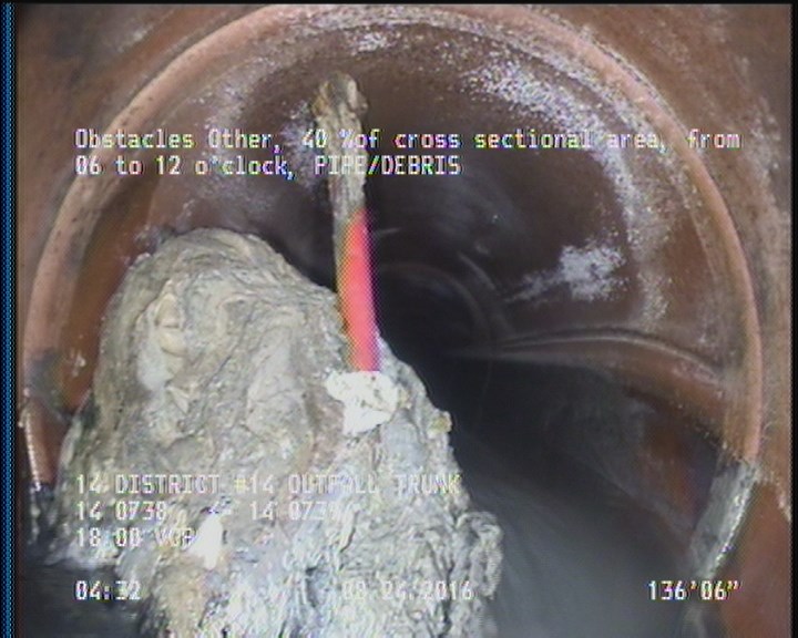 Obstacles Other, 40 %of cross sectional area, from 06 to 12 o'clock - PIPE/DEBRIS